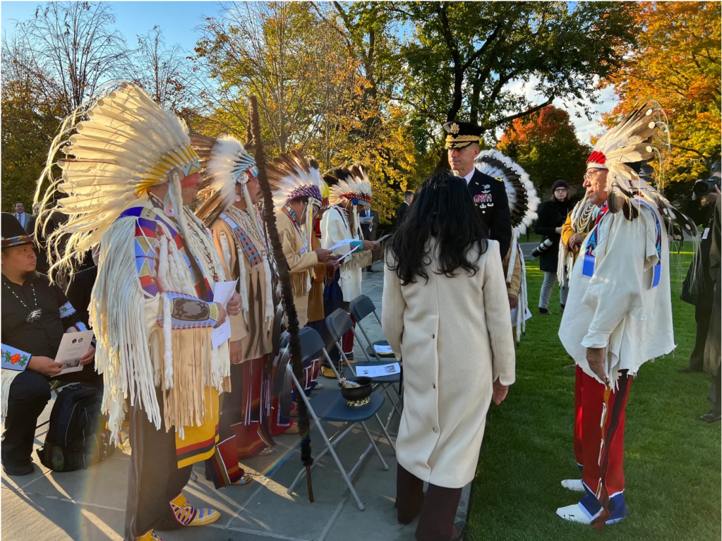 Crow Nation citizens and representatives wait to lay down flowers at the Tomb of the Unknown Soldier Centennial Commemoration in Arlington, Virginia, on November 9, 2021. (Photo by Jourdan Bennett-Begaye, Indian Country Today)