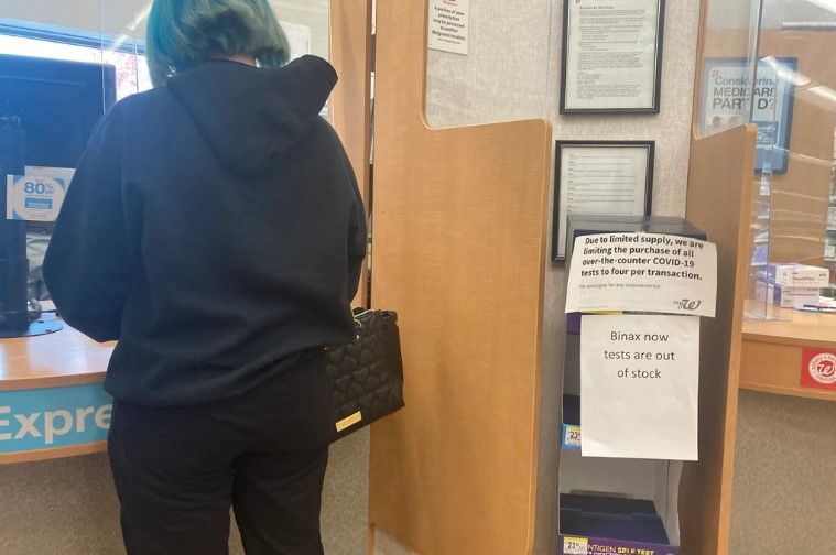 A sign tells customers at the Walgreens pharmacy in Helena, Montana, on Oct. 5, 2021, that sales of at-home Covid-19 tests are being rationed. / KHN Photo Matt Volz